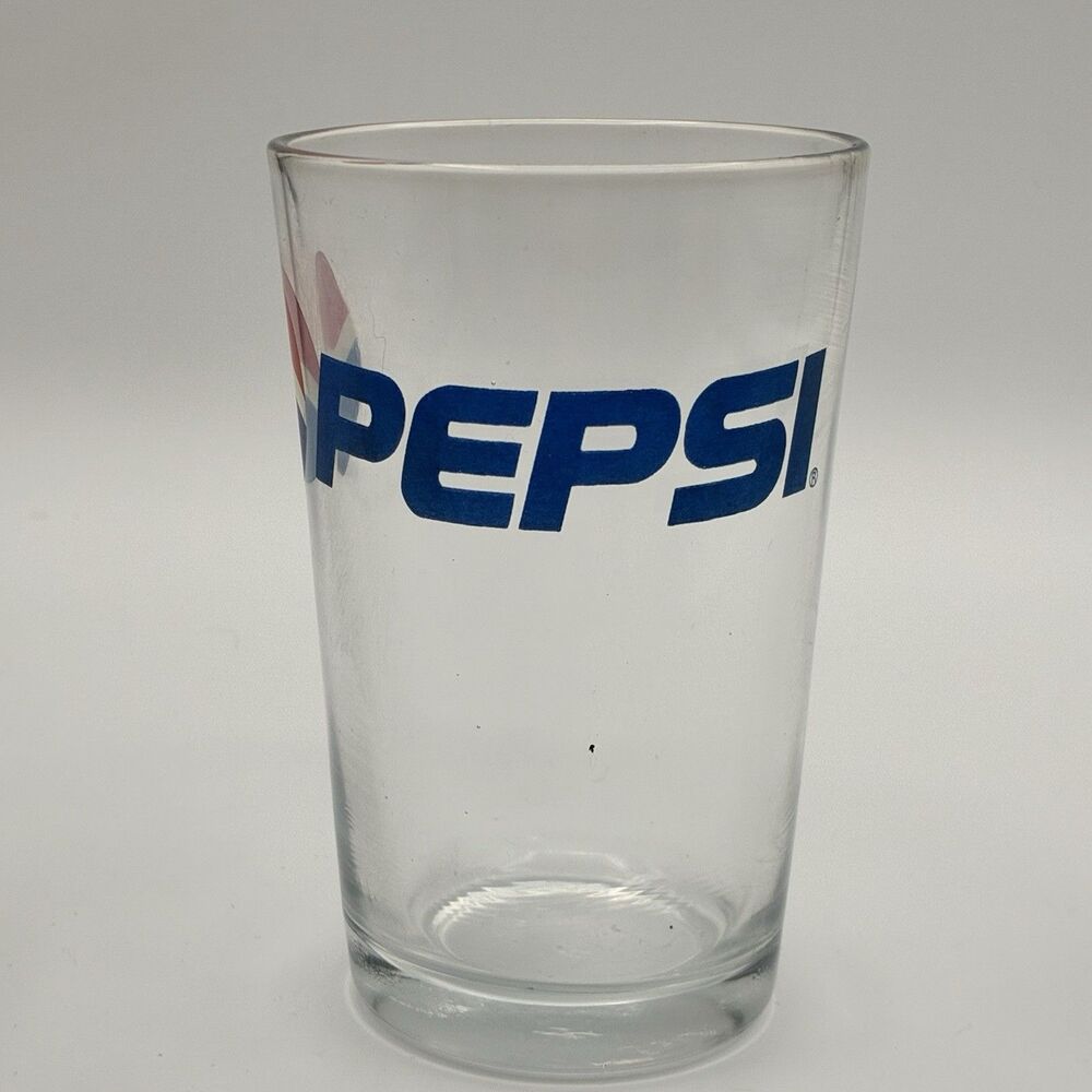 NEW PEPSI WITH GLOBE LOGO ON DRIKNING GLASS
